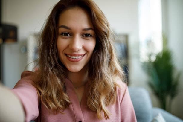 Sophia L., International Business Traveler — OneSkies customer testimonial portrait