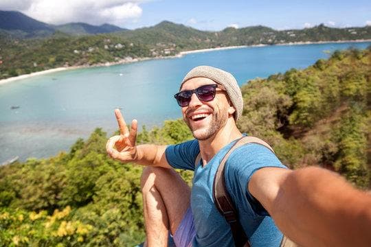 George K., Corporate Travel Manager — OneSkies customer testimonial portrait