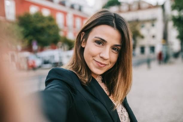 Maria K., Verified Business Traveler — OneSkies customer testimonial portrait